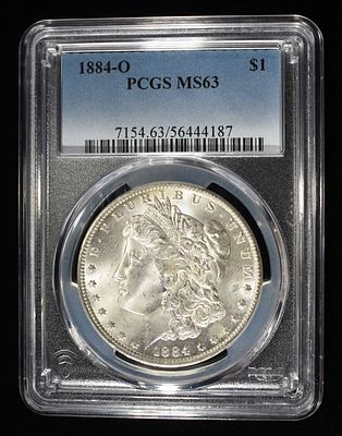 1884-O MORGAN DOLLAR PCGS MS-63. CHECK OUT OUR UPCOMING AUCTIONS ESTIMATE $130 - $150.