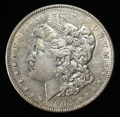 1902 MORGAN DOLLAR. CHECK OUT OUR UPCOMING AUCTIONS ESTIMATE $90 - $130.