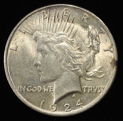 1924 PEACE DOLLAR. LEADERS IN ON-LINE AUCTIONS ESTIMATE $75 - $100.