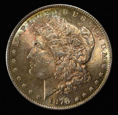 1878 8 TF MORGAN DOLLAR CH BU COLOR. BID WITH SILVER CITY AUCTIONS ESTIMATE $500 - $600.