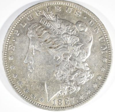 1887-O MORGAN DOLLAR AU. BID WITH SILVER CITY AUCTIONS ESTIMATE $60 - $80.