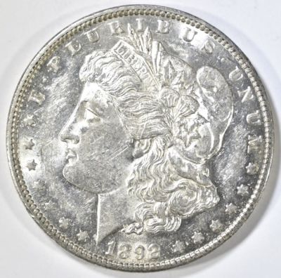 1892-O MORGAN DOLLAR CH BU. CHECK OUT OUR UPCOMING AUCTIONS ESTIMATE $450 - $500.