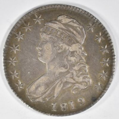 1819 BUST HALF DOLLAR VF. BID WITH SILVER CITY AUCTIONS ESTIMATE $200 - $250.