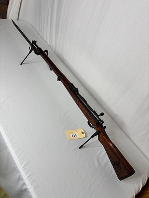 Bolt Action Long Rifle with Bayonet. No markings that indicate caliber, make, model, etc