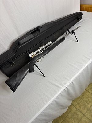 AMT Lightning 25/22 LR. Has AirGlide hard case and Tasco Scope, NO MAG