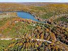21.65&plusmn; Acres with Home, Mobile, and Improvements. This 21.65&plusmn; acre tract offers a rare Image - 67