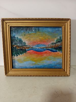 תמונת שמן אומן רוסי חתום 
נוף שקיעה על נהר 
תמונת נוף ממוסגר 
גודל 27 על 23 סמ