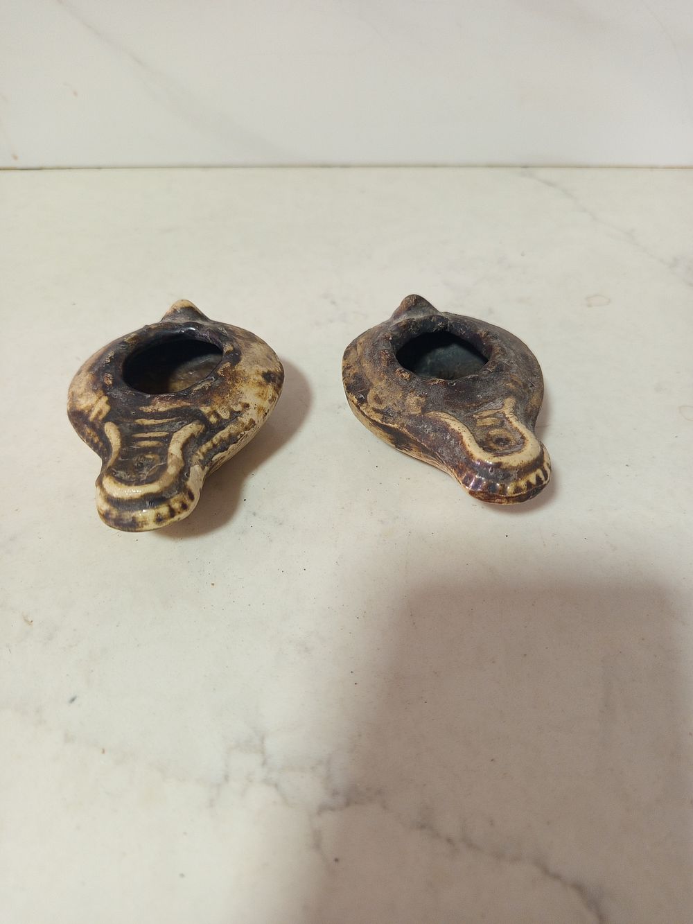 זוג מעמדים נרות שמן 
עשויים חומר משובח 
אורך רוחב 9 על 6 סמ