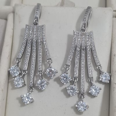 זוג עגילי כסף גדולים ומרשימים, חוסר באבן קטנה