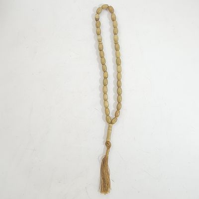מחרוזת חרוזי תפילה איסלאמית (מסבחה) נראה מאבן אגת, גוון חום