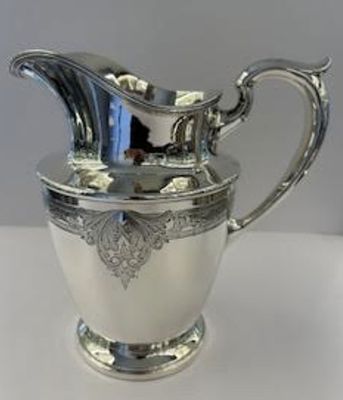 Schofield Sterling Silver Water Pitcher Jug. Schofield Silver Co of Baltimore, Maryland. It is 