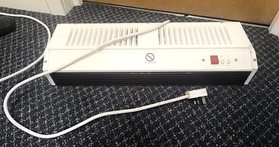 Eterna Lighting 3kW Air Curtain Wall Heater. A white Eterna Lighting 3kW air curtain wall heater