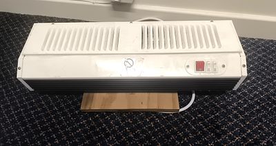 Eterna 3KW SH3WH Air Curtain Heater. A white Eterna 3KW SH3WH air curtain wall heater with