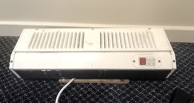 Eterna Lighting 3KW Air Curtain Wall Heater. A white Eterna Lighting 3KW air curtain wall heater
