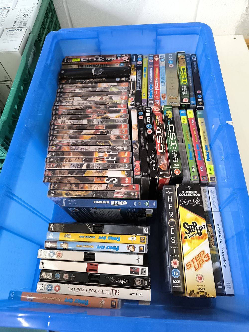 A Large Job Lot of Mixed DVDs, Blu-rays, and Video Game. A large job lot of mixed consumer media 