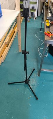 Modern Adjustable Tripod Base Microphone Stand. A modern adjustable microphone stand, featuring 