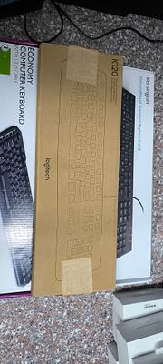 Three Contemporary Boxed Computer Keyboards by Logitech, Kensington, and Economy. A group of 