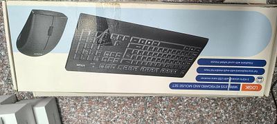 Three Logik Wireless Keyboard and Mouse Sets, each contained within its original retail 