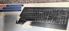 LOGIK Wireless Multimedia Keyboard 2.4 GHz LCMMKB23 and a Sandstrom Ultra-slim Wireless Keyboard. Image - 1