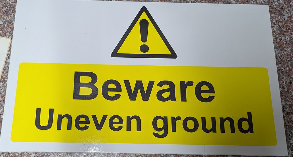 uneven ground sign 50cm by 30cm