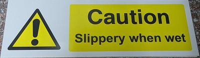 slippery when wet sign 45cm by 15cm