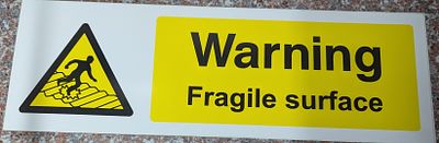 fragile surface sign 45cm by 15cm