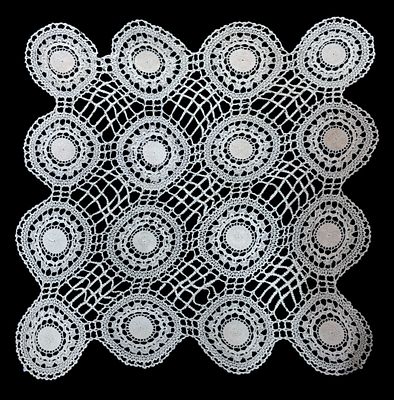 Tablecloth, in cream crochet.