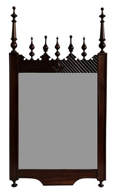Wall mirror, with mahogany frame and carved work. Height 0.87 x 0.48.
