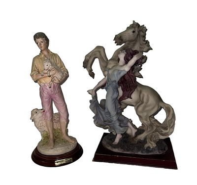 2 Grupos, Figura feminina e cavalo e Rapaz junto de ovelhas, em marfinite, etc., decoração 
