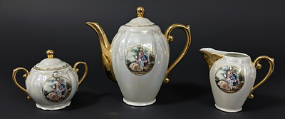 Set of teapot, milk jug and sugar bowl, made of Viana porcelain, polychrome decoration with 