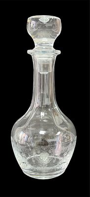 Crystal bottle with engravings. Height 0.27.