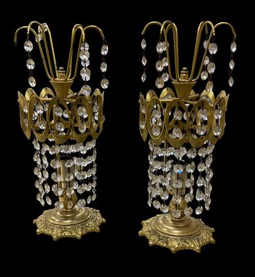 Pair of table lamps, in gold-plated metal, with glass pendants. Height 0.33.