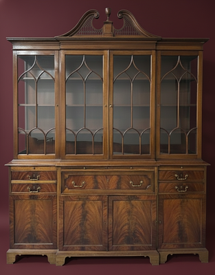 English-style mahogany dining room cabinet with four doors, four drawers, a writing desk, three 