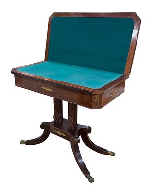 Empire-style mahogany game table with a lift-up top, gold-tone metal accents, and claw-shaped 