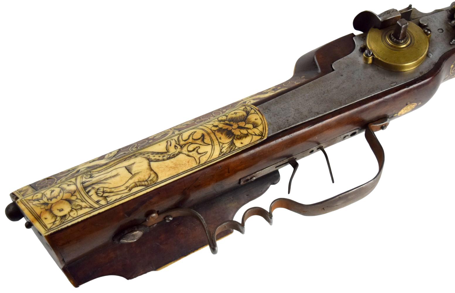 A Fine Inlaid Saxon Wheellock Sporting Rifle With Gilded Wheel Cover Circa 1600.