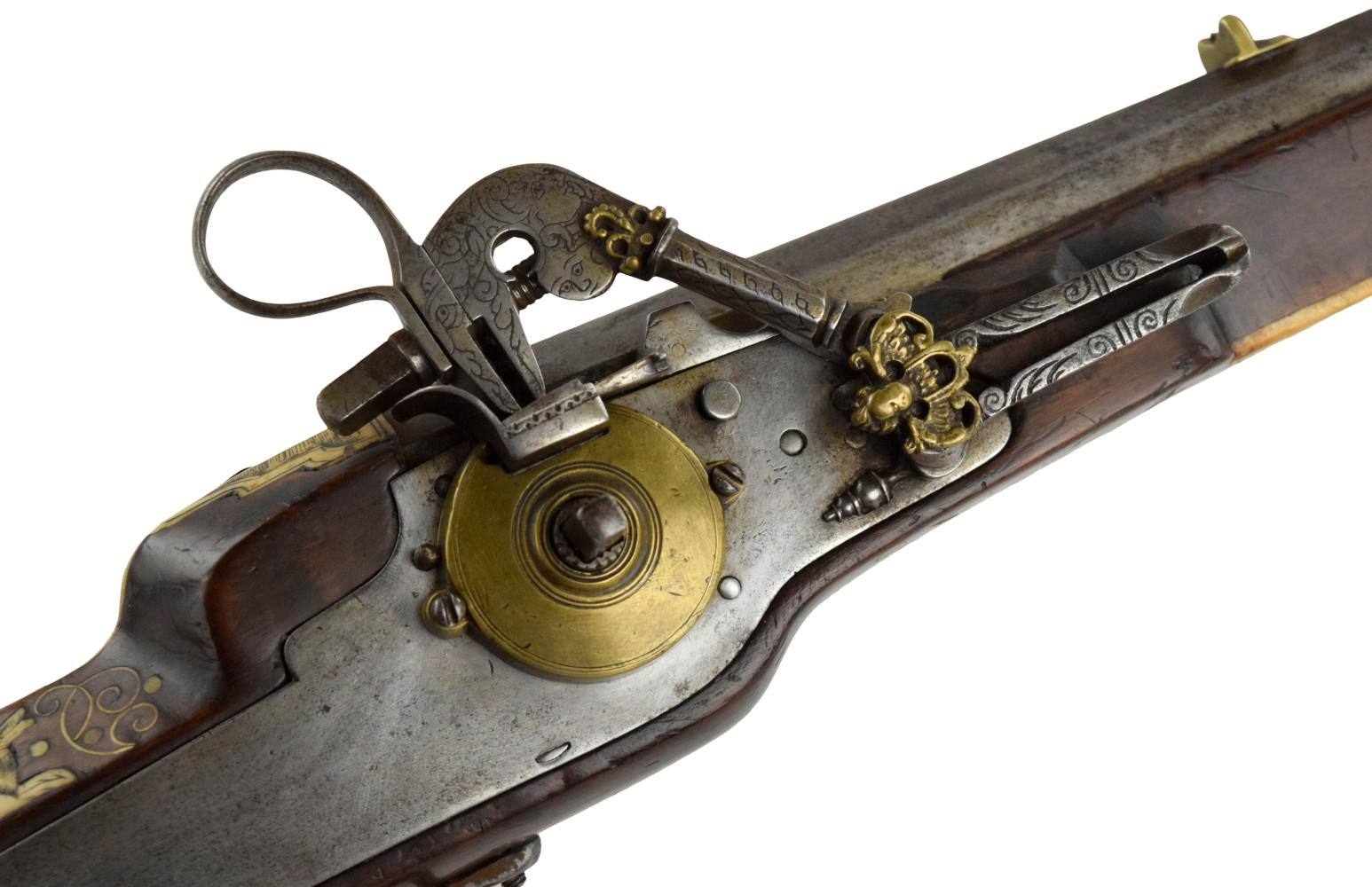 A Fine Inlaid Saxon Wheellock Sporting Rifle With Gilded Wheel Cover Circa 1600.