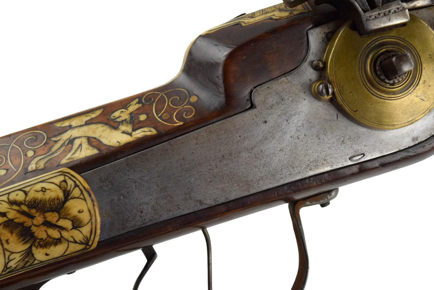 A Fine Inlaid Saxon Wheellock Sporting Rifle With Gilded Wheel Cover Circa 1600.