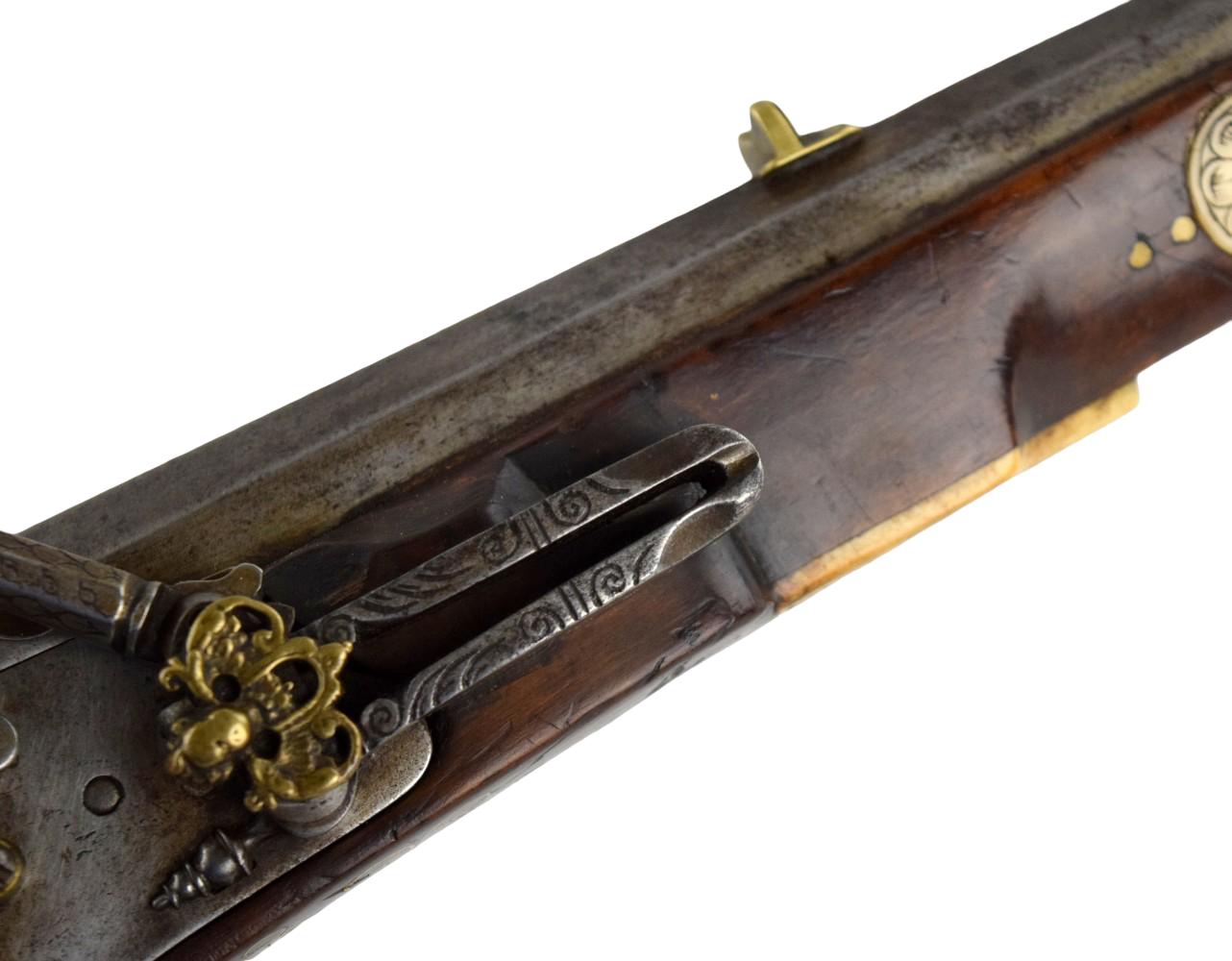 A Fine Inlaid Saxon Wheellock Sporting Rifle With Gilded Wheel Cover Circa 1600.