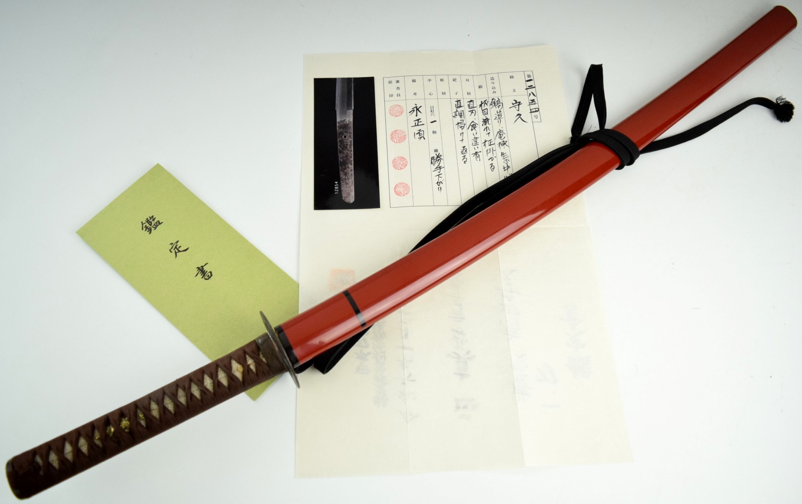 Early 1500 Koto katana, 27 and 1/2 inch length of cutting edge, exceptional condition blade and mounts.