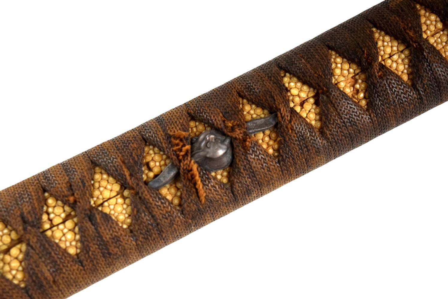 Shinto katana, 27 and 1/2 inch length of cutting edge, signed Ganmaku, ca. late 1500âs.