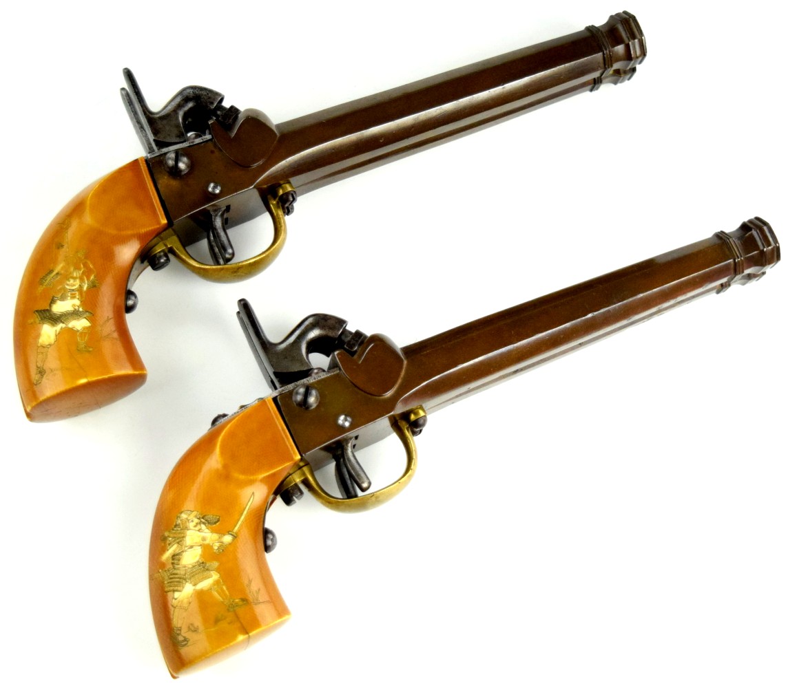 AN EXTREMELY RARE 1860 AND UNIQUE MATCHED PAIR OF DOUBLE BARREL JAPANESE PERCISSION CARRIAGE PISTOLS CIRCA 1860