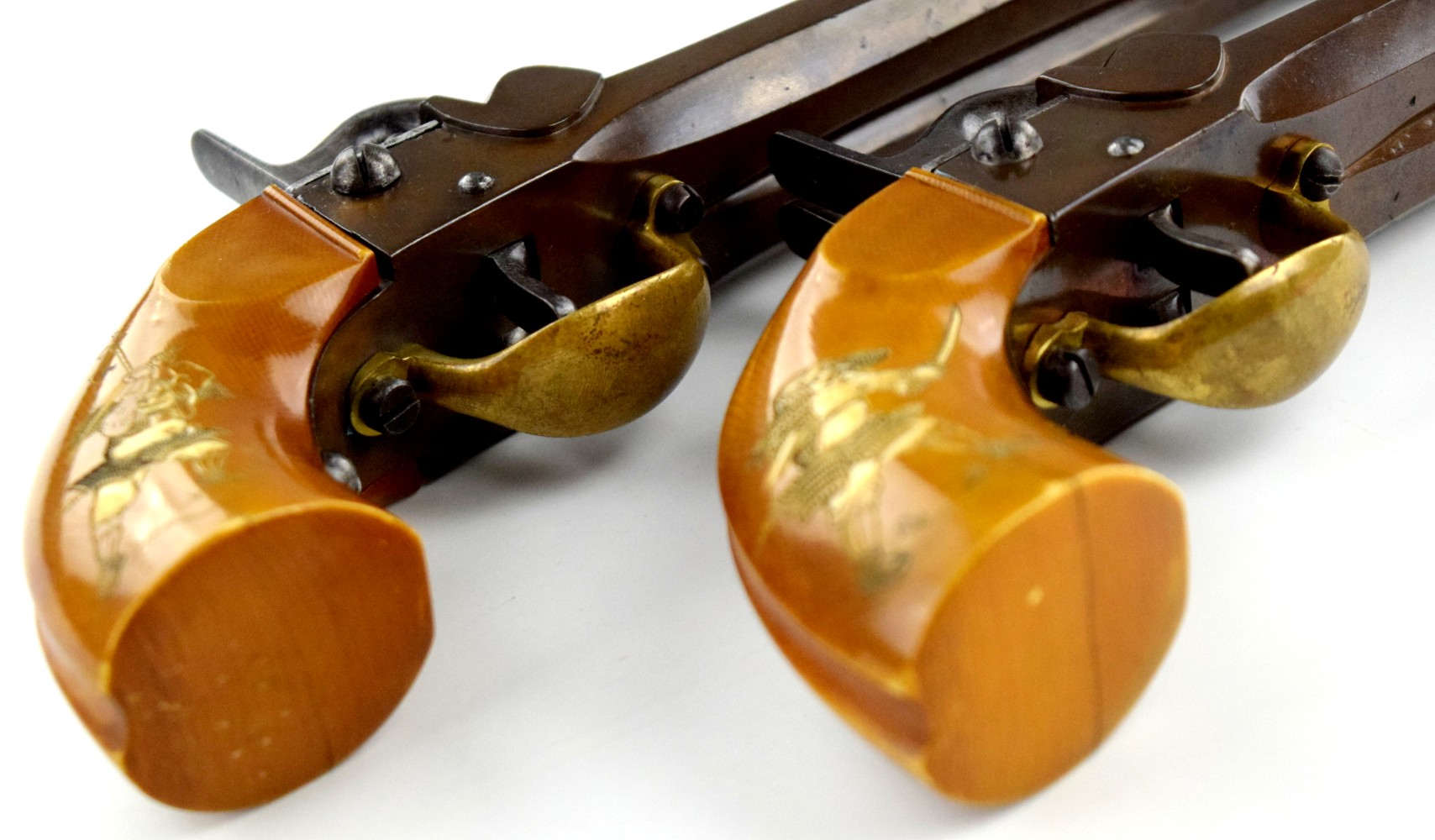 AN EXTREMELY RARE 1860 AND UNIQUE MATCHED PAIR OF DOUBLE BARREL JAPANESE PERCISSION CARRIAGE PISTOLS CIRCA 1860