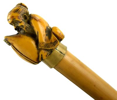 Japanese Bamboo Walking Stick With Netsuke Handle. Japanese bamboo walking stick with carved 