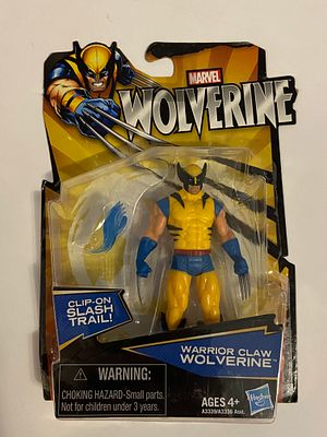 אספנות - יקום מרוול - וולברין : אקשן פיגר סגור באריזה המקורית של וולברין במדי האקסמן הצהובים 