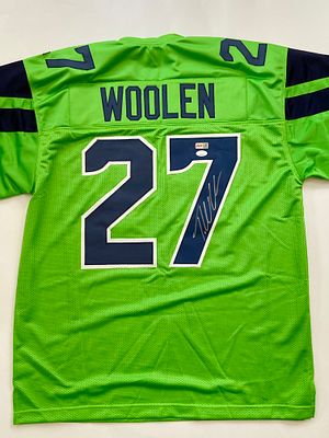 אספנות - NFL - ליגת הפוטבול האמריקאית : חולצת NFL עם חתימה ידנית ומקורית של TARIQ WOOLEN במדי 