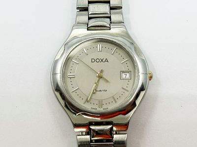 Zegarek męski Doxa Quartz 35 mm. Zegarek stalowy, kwarcowy, z datownikiem, WR30M. Numery na
