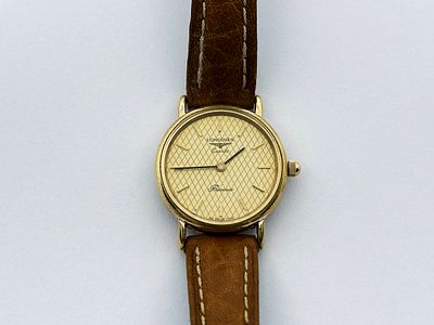 Zegarek damski Longines Presence 24 mm. Zegarek pozłacany, kwarcowy. Numery na deklu: 24358694.