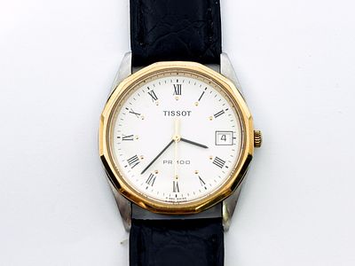 Zegarek męski/unisex Tissot PR100 34 mm. Zegarek stalowy z pozłoceniem, kwarcowy, z DayDate
