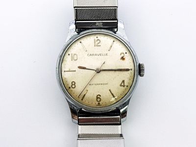 Zegarek męski/unisex Caravelle (Bulova) 32 mm. Zegarek chromowany, mechaniczny. Cal: 11OFC.