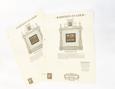 Dwa limitowane znaczki pozłacane "Brama Brandenburska". Stan wizualny bardzo dobry, widoczny na 